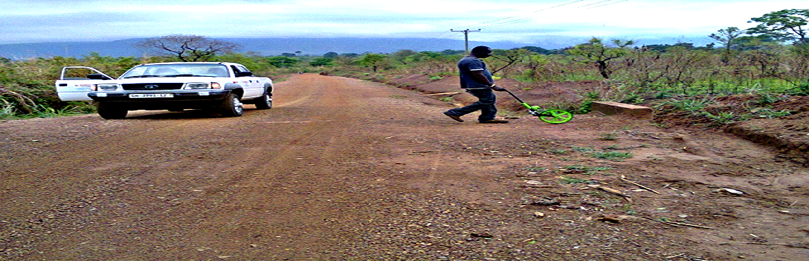 Taking measurement of culvert Odumase Jn-Odumase